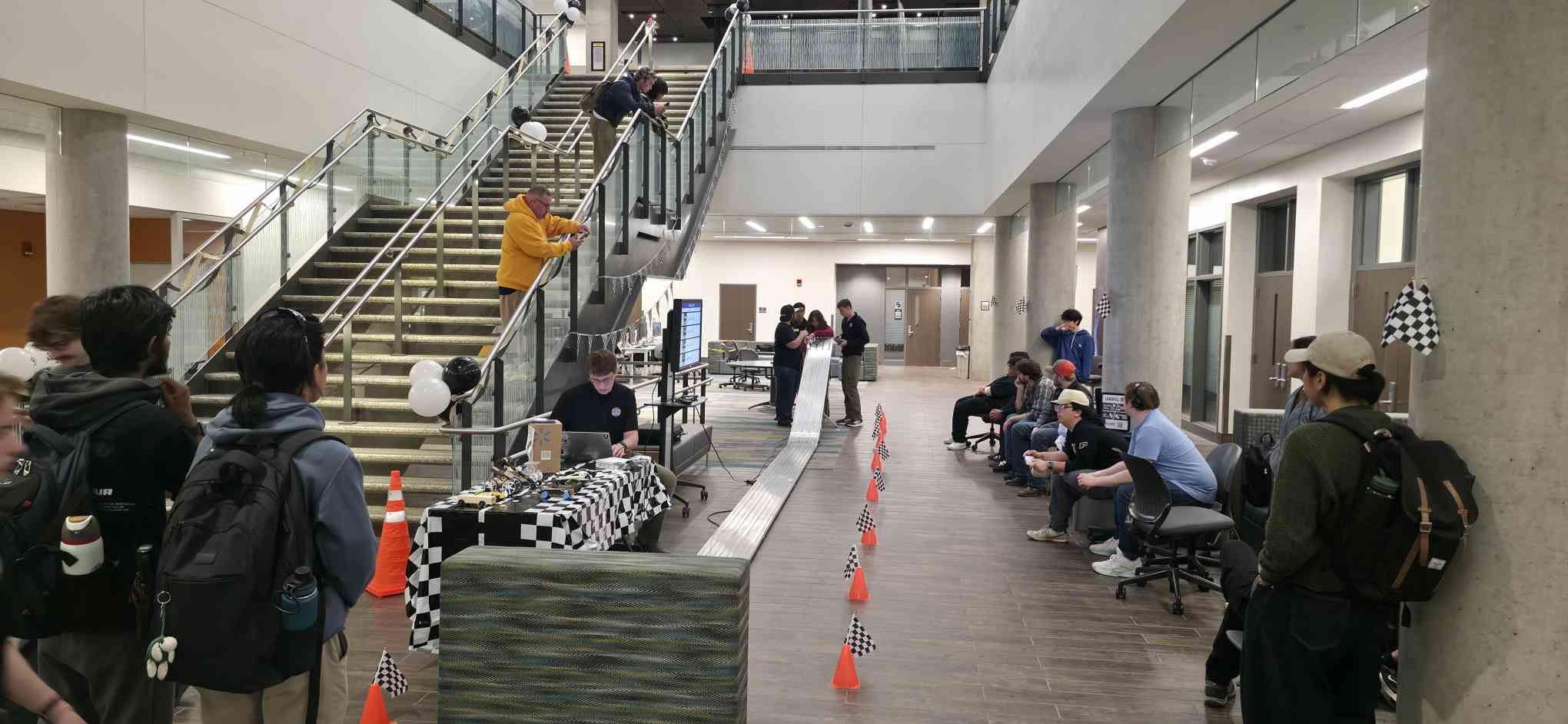 People watching Pinewood Derby Race