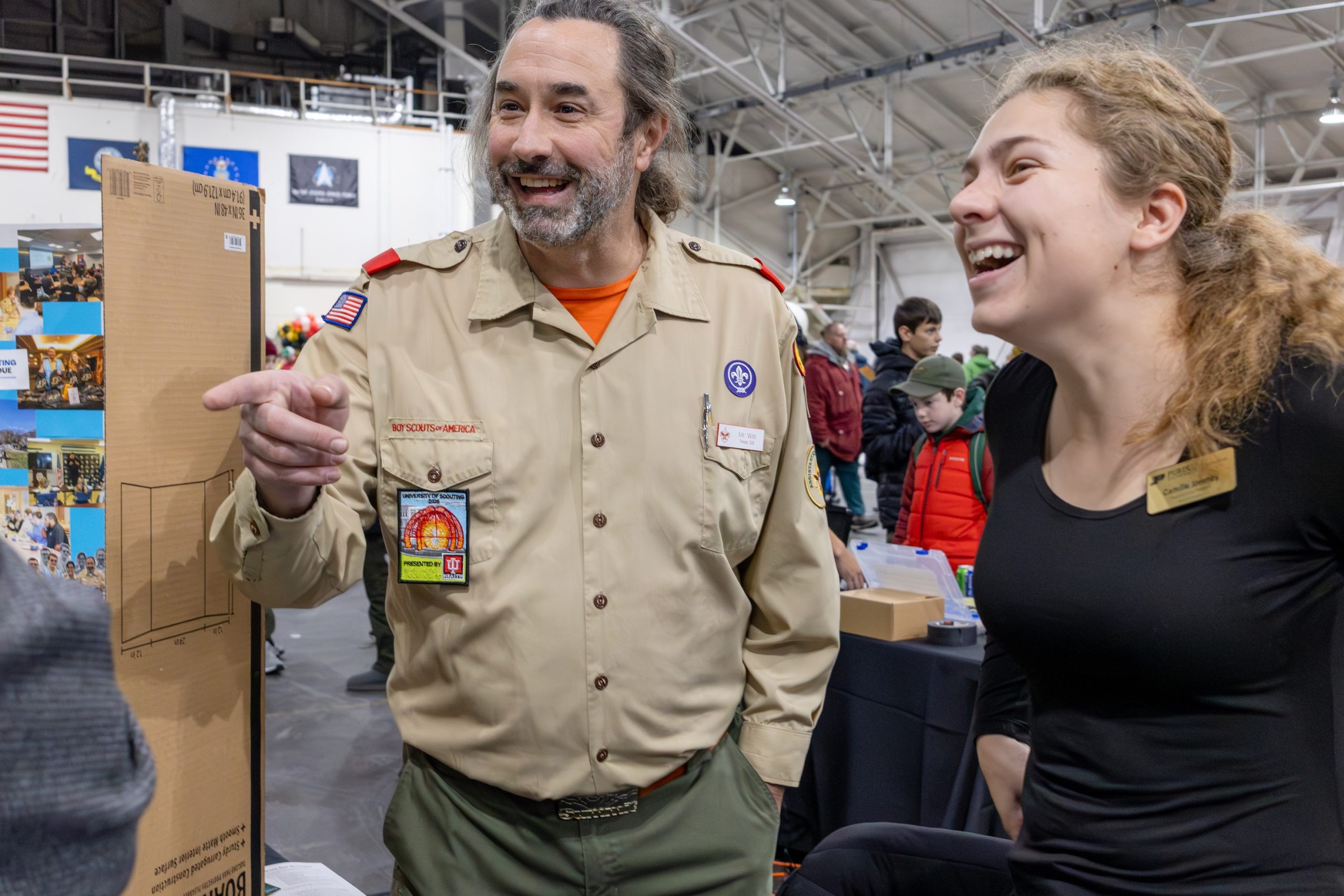 Two people talking and laughing